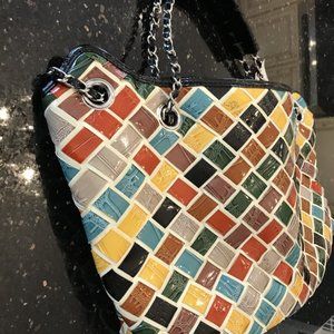 colorful brand new handbag tag on